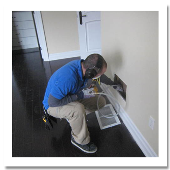 Man cleaning air ducts Air duct cleaning from Superior Air Duct Cleaning