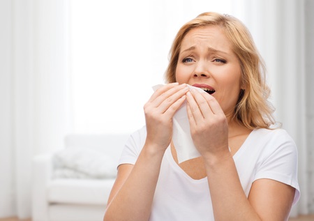 Woman with Indoor Allergies How to Prevent Indoor Allergies