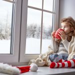 Girl enjoying clean furnace warm home