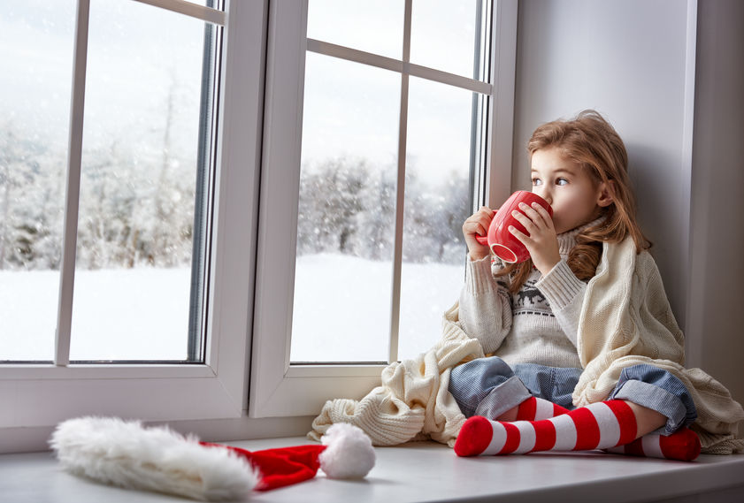 Girl Drinking Hot Chocolate Girl enjoying clean furnace warm home